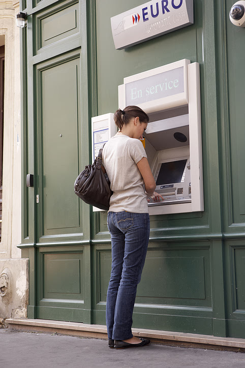 girl at ATM